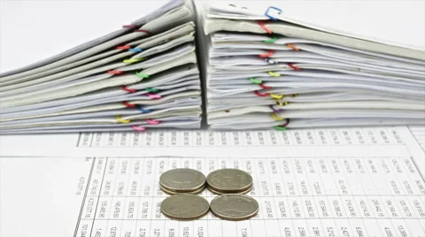 House on pile coins and stack of sales time lapse Stock Footage 41674419
