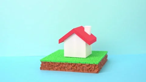 A house on a plot of land representing property investment. Buying a home, Stock Footage 335836952