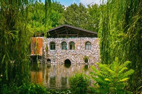 House on the pond Stock Photos