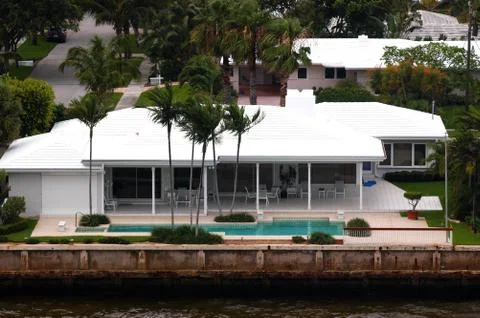 House with pool Stock Photos
