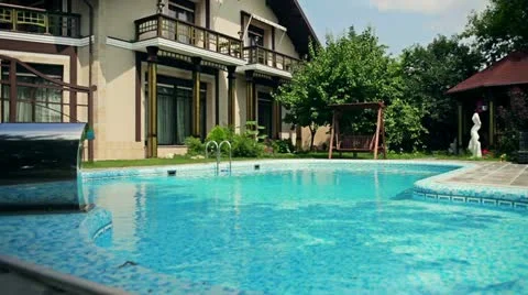 Of a house with a pool in the yard Stock Footage 20636656