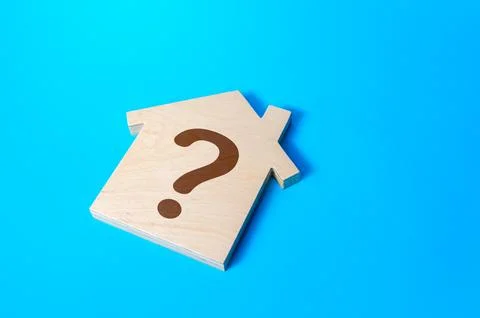 House with a question mark. Solving housing problems, deciding buy or rent .. Stock Photos