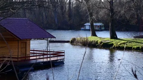 House rafts on the river Stock Footage 49274880