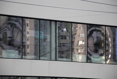 House reflected in a window. Stock Photos