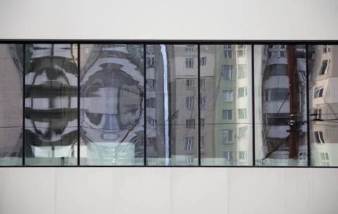 House reflected in a window. Stock Photos