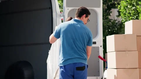 House Relocation. Men Unloading From Truck 스톡 동영상 314136723