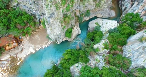 A House, River and Canyon Top Aerial View Stock Footage 148411253