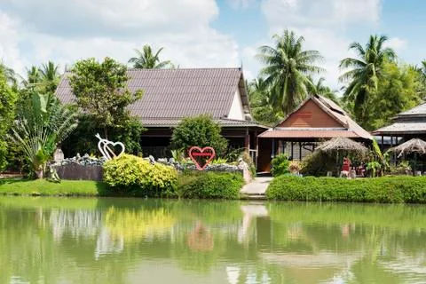 House by the river. Stock Photos