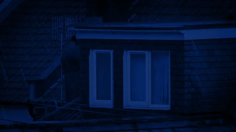 House Roof In The Rain At Night Stock Footage