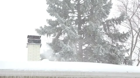 House rooftop during blizzard, video Stock Footage 47205076