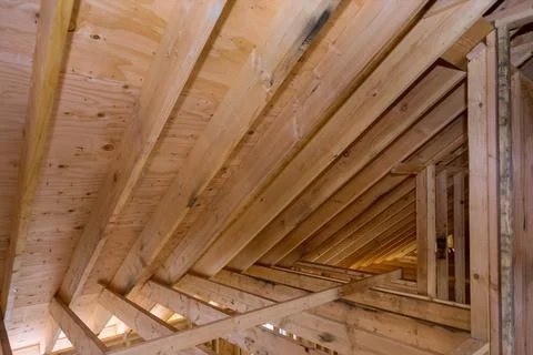 House room interior under construction unfinish roofing wooden frame of beam  Stock Photos