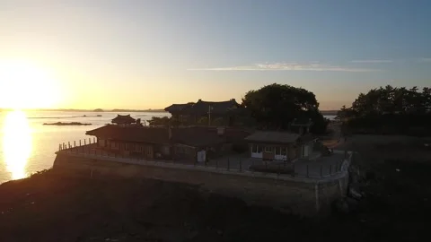 House by the sea with a sunset Stock-Footage 306034058