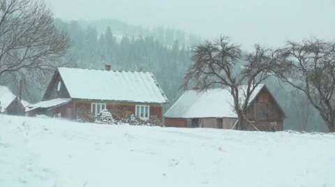A house in a snow blizzard, in the mountains Stock Footage 52753353