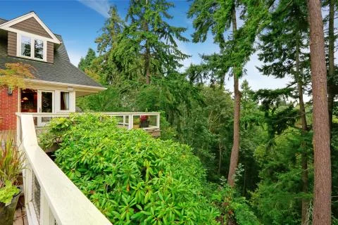House with spacious walkout deck overlooking amazing landscape Stock Photos