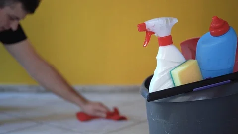 House spring cleaning items or supplies in a bucket. Stock Footage 124807255