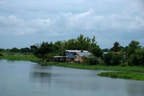 House by a Swelling River Stock Photos