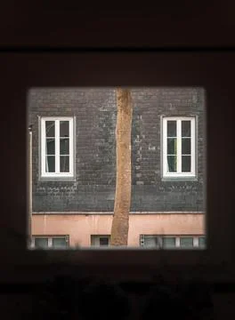 A house through the window of a house Stock Photos