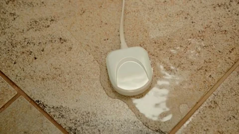 In the house on the tiled floor the sensor give emergency signal a water leak  Stock Footage 297771570