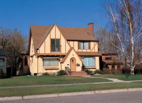 House by tree Stock Photos