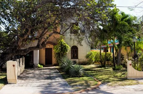 House in tropical setting Stock Photos