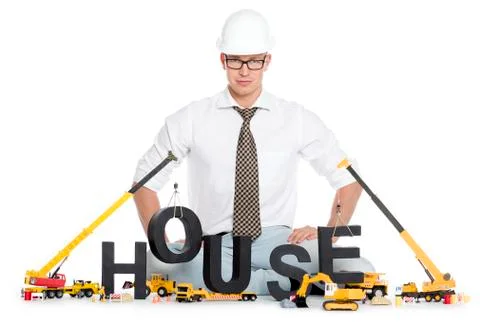 House under construction: Engineer building house-word. Foto stock