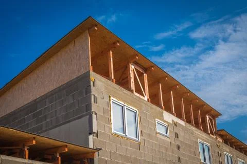 House under construction. Just after instalation of fibreboard on the roof Stock Photos