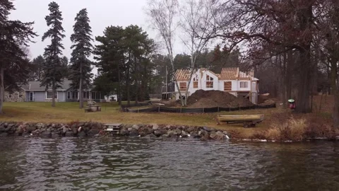 House under construction on lakefront Stock-Footage 312065142