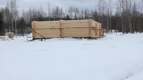 The A house under construction from a log. Frame of a log house in winter. Stock Footage 170794702