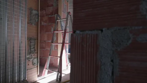 House under construction or house with scaffolding. Building under construction Stock Footage 258737015