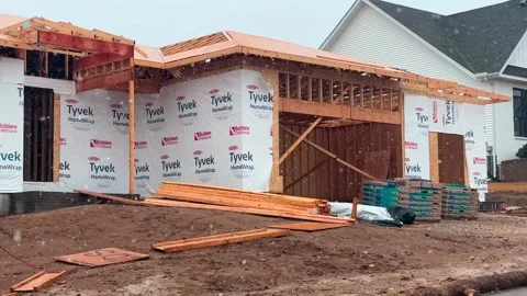 House Under Construction - Snow - Wide - Bettendorf, IA - Mar 5th 2025 Stock Footage 303600528