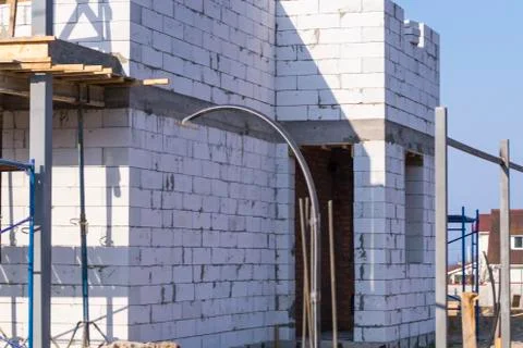 House under construction with white bricks. Stock Photos