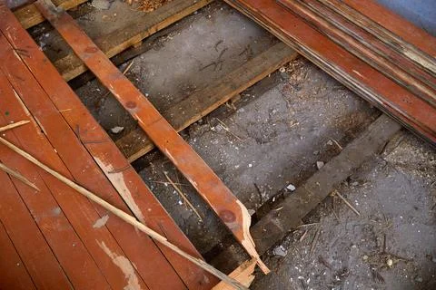 The house is undergoing renovation work to replace the old wooden floors Stock Photos
