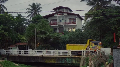 House view, roadway in front of it, asia Stock Footage 231499844