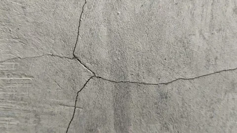 The house wall is cracked. The crack was caused by extreme weather Stock-Footage 286402359