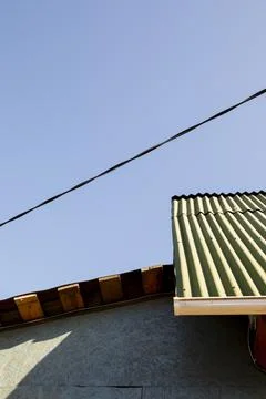 House wall from OSB slabs against the blue sky Stock Photos