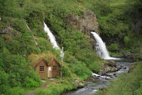 House by the waterfall Stock Photos