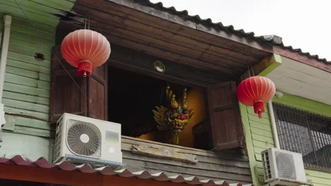House window with dragon puppet decoration in Bangkok Stock Footage 346213759