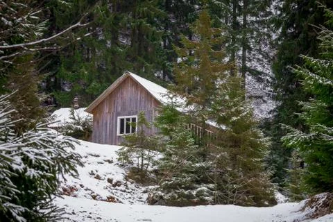 House in winter forest Stock Photos