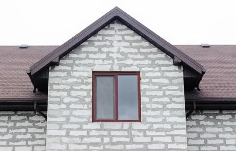 A house without a facade built from gas blocks. Construction concept Stock Photos