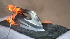 Faulty home appliance is burn, an iron f, Stock Video