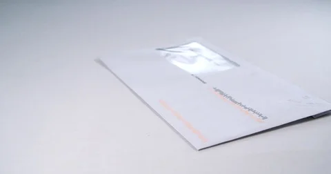 Household bills falling on white background in slow motion Stock Footage 71327513
