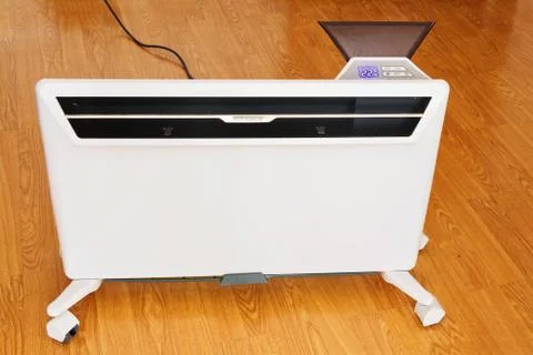 Household electric convector for space heating. Foto stock