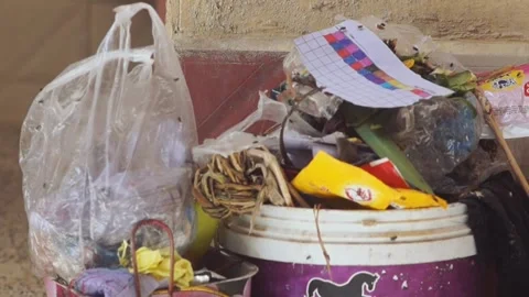 Household Garbage &amp; Plastic Waste Indoors In Lahore, Pakistan: 25 May 2026 Video stock 336108111
