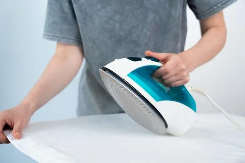 Household Ironing Routine Stock Photos