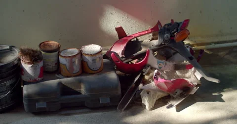 Household trash includes plastic paint cans, car frames, and plastic crates. Stock Footage 261986425