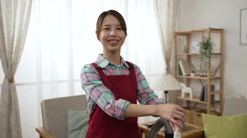 Householde face camera and smile attractive Stock Footage 170830503