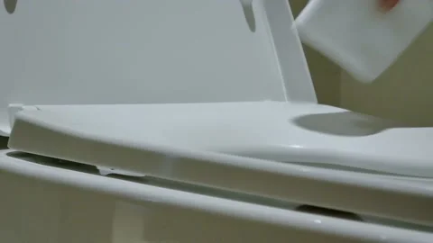 Housekeeper is making the bed in the room Stock Footage 142145424