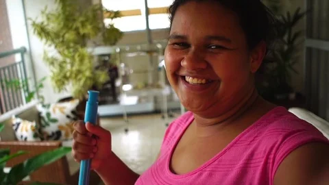 Housekeeper taking a selfie at home Stock Footage 83215853