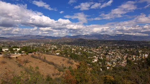 Houses and Clouds Timelapse Stock Footage 100872867