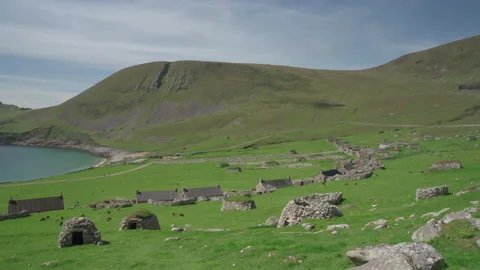 Houses and dry-stone structures on Hirta, St Kilda, Scotland Stock Footage 229399370